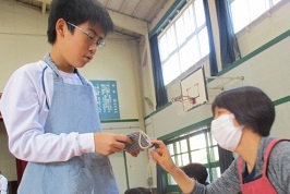 編み