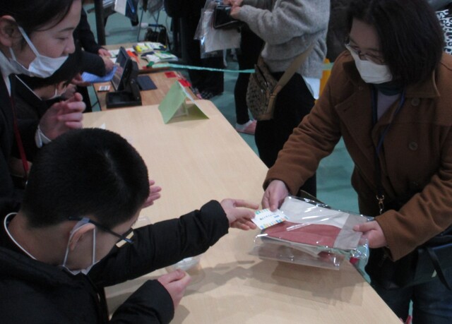 販売会
